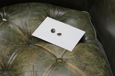 Lot 849 - A barrel back armchair