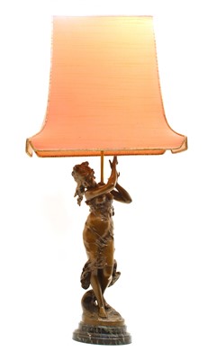 Lot 624 - A bronzed spelter figural table lamp after Auguste Moreau