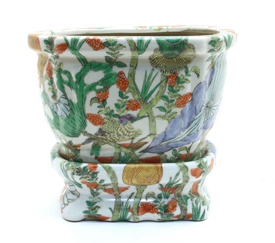 Lot 170 - A Chinese porcelain planter on stand