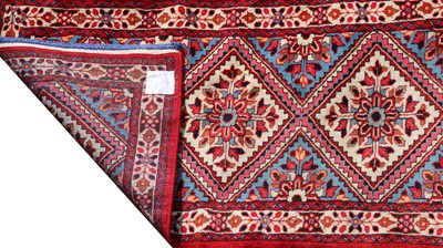 Lot 302 - A long North West Persian runner