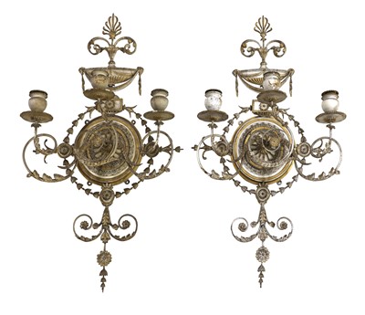 Lot 337 - A pair of painted and gilt gesso wall appliques