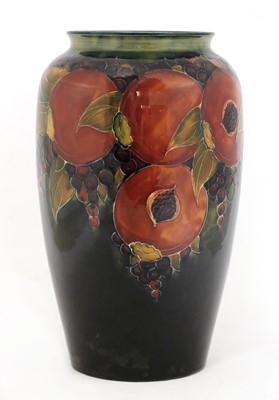 Lot 220 - A William Moorcroft tubeline decorated 'Pomegranate' vase