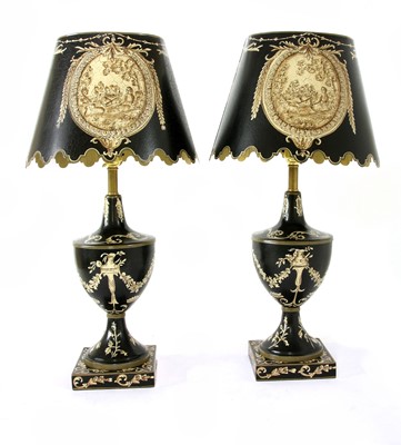Lot 693 - A pair of toleware table lamps