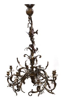 Lot 237 - A pair of French rococo-style gilt-bronze eight-light chandeliers