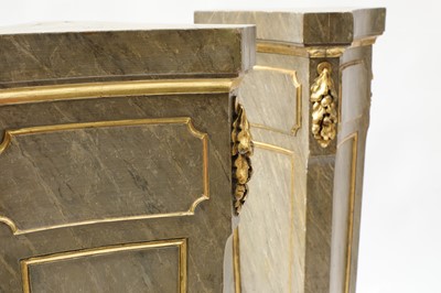 Lot 404 - A pair of faux marble pedestals
