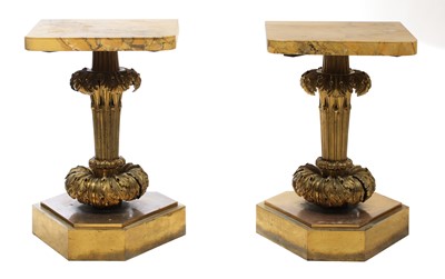 Lot 236 - A pair of French gilt bronze pier tables