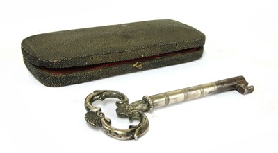Lot 821 - A large white metal and steel key