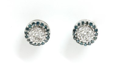 Lot 163 - A pair of diamond and treated blue diamond cluster earrings