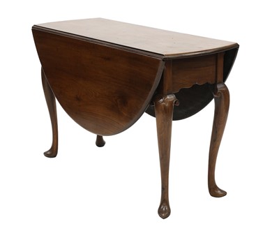 Lot 459 - A George III mahogany oval drop-leaf table