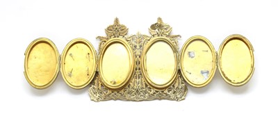 Lot 129 - An engraved and pierced brass folding photograph frame
