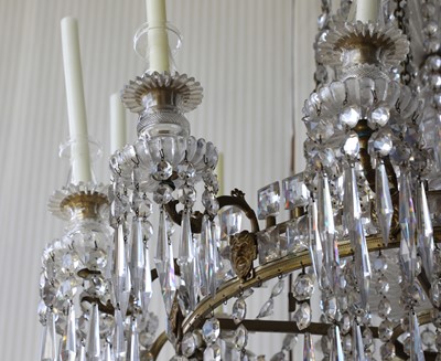 Lot 68 - A large George III-style gilt brass and cut-glass twelve-light chandelier