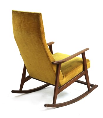Lot 343 - A teak rocking chair