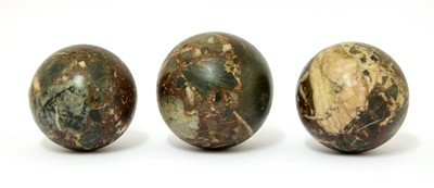 Lot 341 - A set of three grand tour marble balls