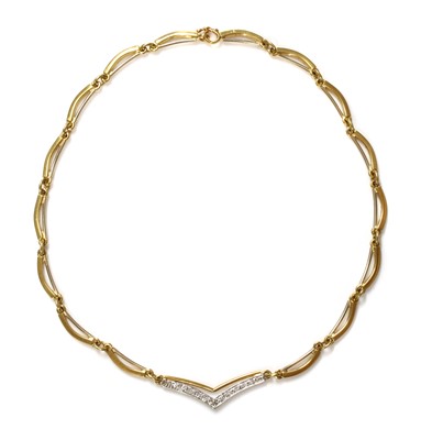 Lot 260 - A two colour gold, diamond set, swag necklace with a 'V' shaped centrepiece