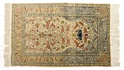 Lot 812 - A Turkish silk Hereke rug
