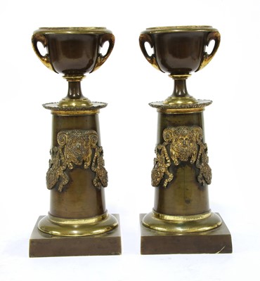 Lot 327 - A pair of Regency bronze and gilt-bronze cassolettes