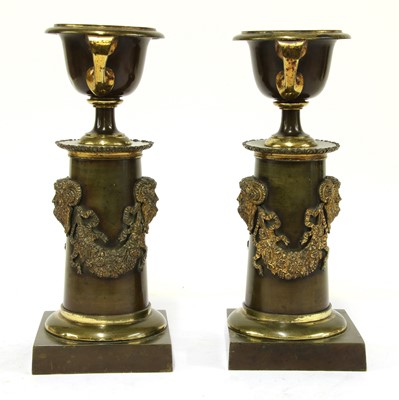 Lot 327 - A pair of Regency bronze and gilt-bronze cassolettes