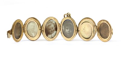 Lot 23 - A gold egg form multi-photo 'family' locket
