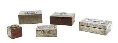 Lot 412 - A collection of Arts and Crafts style pewter clad boxes