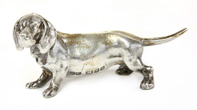 Lot 15 - A cast silver figure of a dachshund