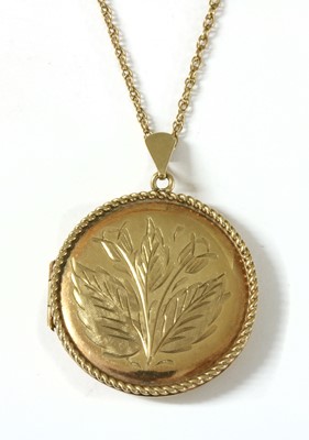Lot 310 - A 9ct gold circular locket