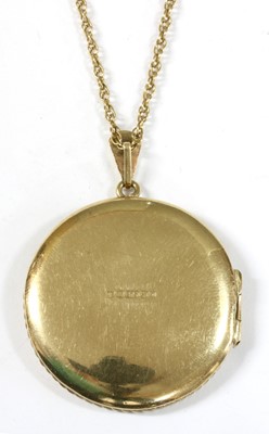 Lot 310 - A 9ct gold circular locket