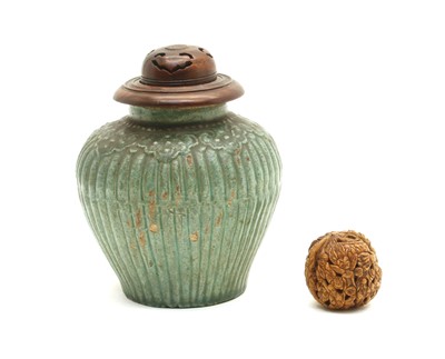 Lot 118 - A Chinese provincial pottery jar and cover