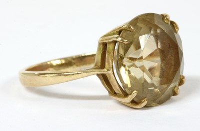 Lot 220 - A gold single stone citrine ring