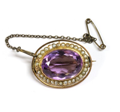 Lot 52 - An gold amethyst and split pearl brooch
