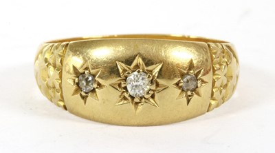 Lot 25 - A Victorian 18ct gold three stone diamond ring