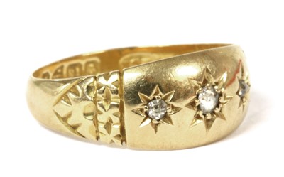 Lot 25 - A Victorian 18ct gold three stone diamond ring