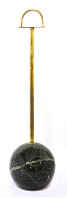 Lot 356 - A brass-mounted serpentine marble doorstop