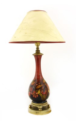 Lot 212 - A Moorcroft flambé 'Orchid' table lamp