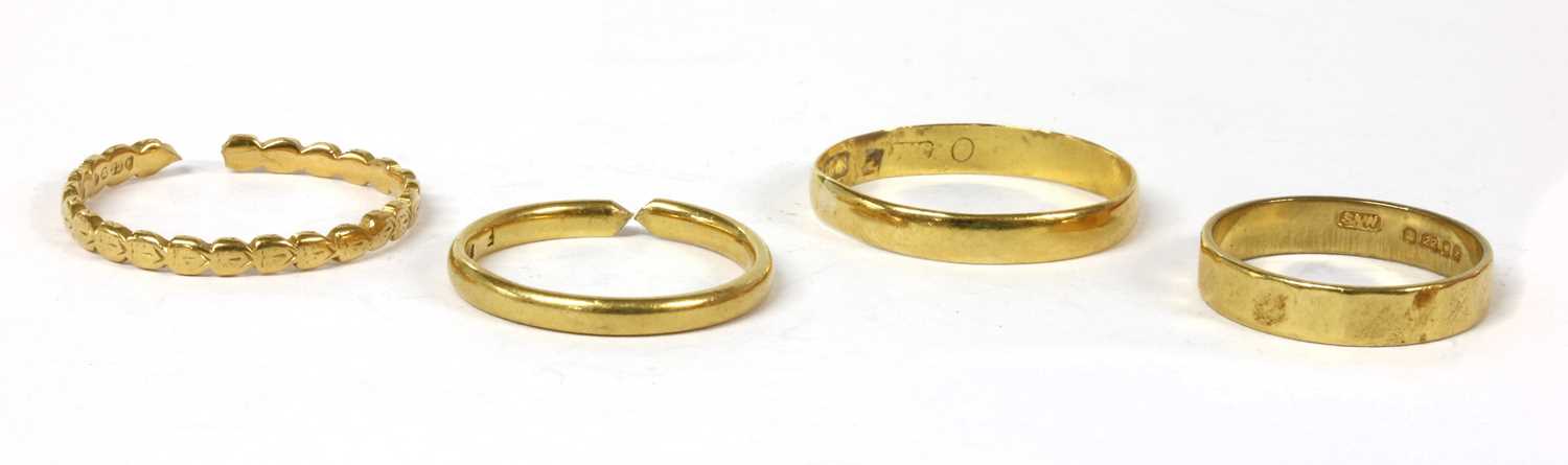 Lot 323 - Four 22ct gold wedding rings