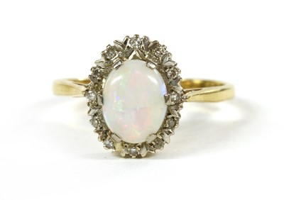 Lot 207 - An 18ct gold opal and diamond cluster ring