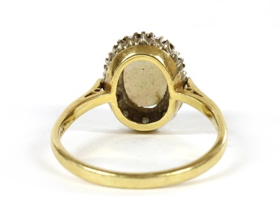 Lot 207 - An 18ct gold opal and diamond cluster ring