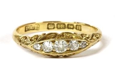 Lot 26 - An 18ct gold boat shaped five stone diamond ring
