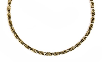 Lot 312 - A 9ct white and yellow gold necklace