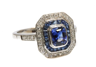 Lot 275 - A white gold sapphire and diamond octagonal target-style cluster ring