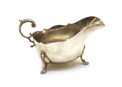 Lot 27 - A George V silver sauce boat
