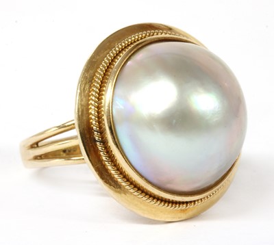Lot 246 - A gold mabé pearl ring
