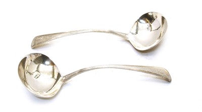 Lot 24 - A pair of George III Old English pattern and thread silver sauce ladles