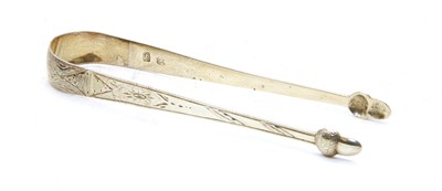 Lot 60A - A pair of George III silver sugar tongs