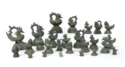 Lot 890 - A collection of Burmese bronze opium weights