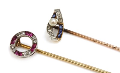 Lot 59 - Three Art Deco diamond set stick pins