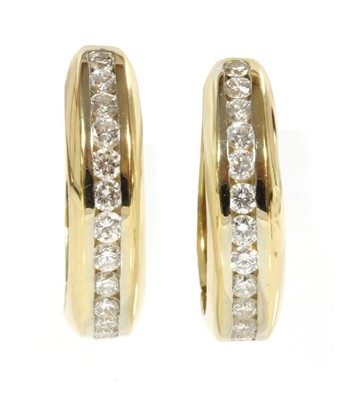 Lot 257 - A pair of Continental gold diamond set hoop earrings