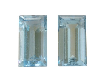 Lot 320 - A pair of unmounted rectangular step cut aquamarines