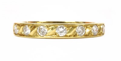 Lot 176 - An 18ct gold diamond half eternity ring