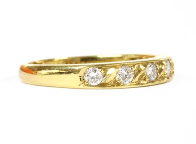 Lot 176 - An 18ct gold diamond half eternity ring