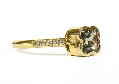 Lot 288 - An 18ct gold green sapphire and diamond ring